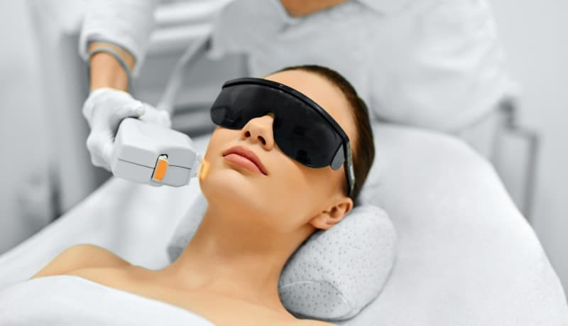 Woman getting an IPL procedure done